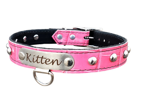 The Croc Submissive Leather Name Collar with Round Studs is a stylish addition to any bedroom. Made from high-quality, croc-textured leather sewn on top of full grain leather, this collar features a customizable stainless steel nameplate and is adorned with round studs